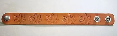 HEMP POT LEAF MARIJUANA HAND STAMPED AND STAINED LEATHER BRACELET ADJUSTABLE