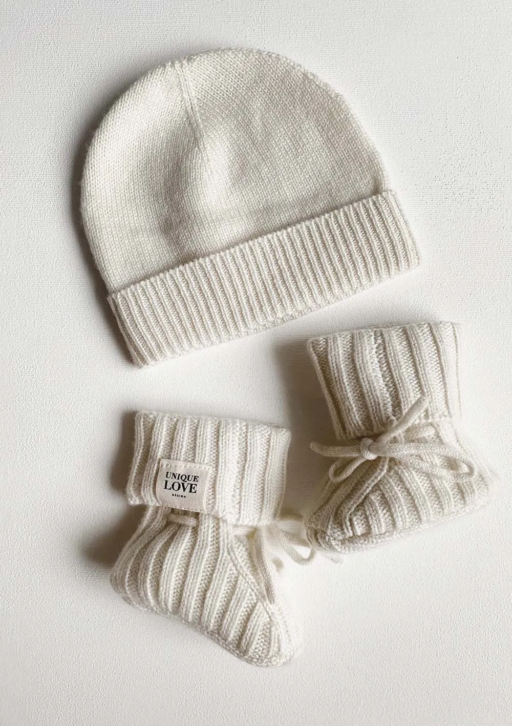Newborn Cashmere Strickschuhe creme