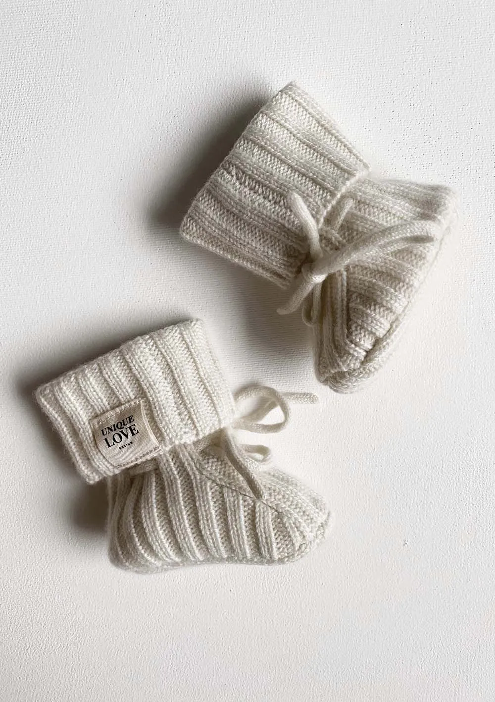 Newborn Cashmere Strickschuhe creme