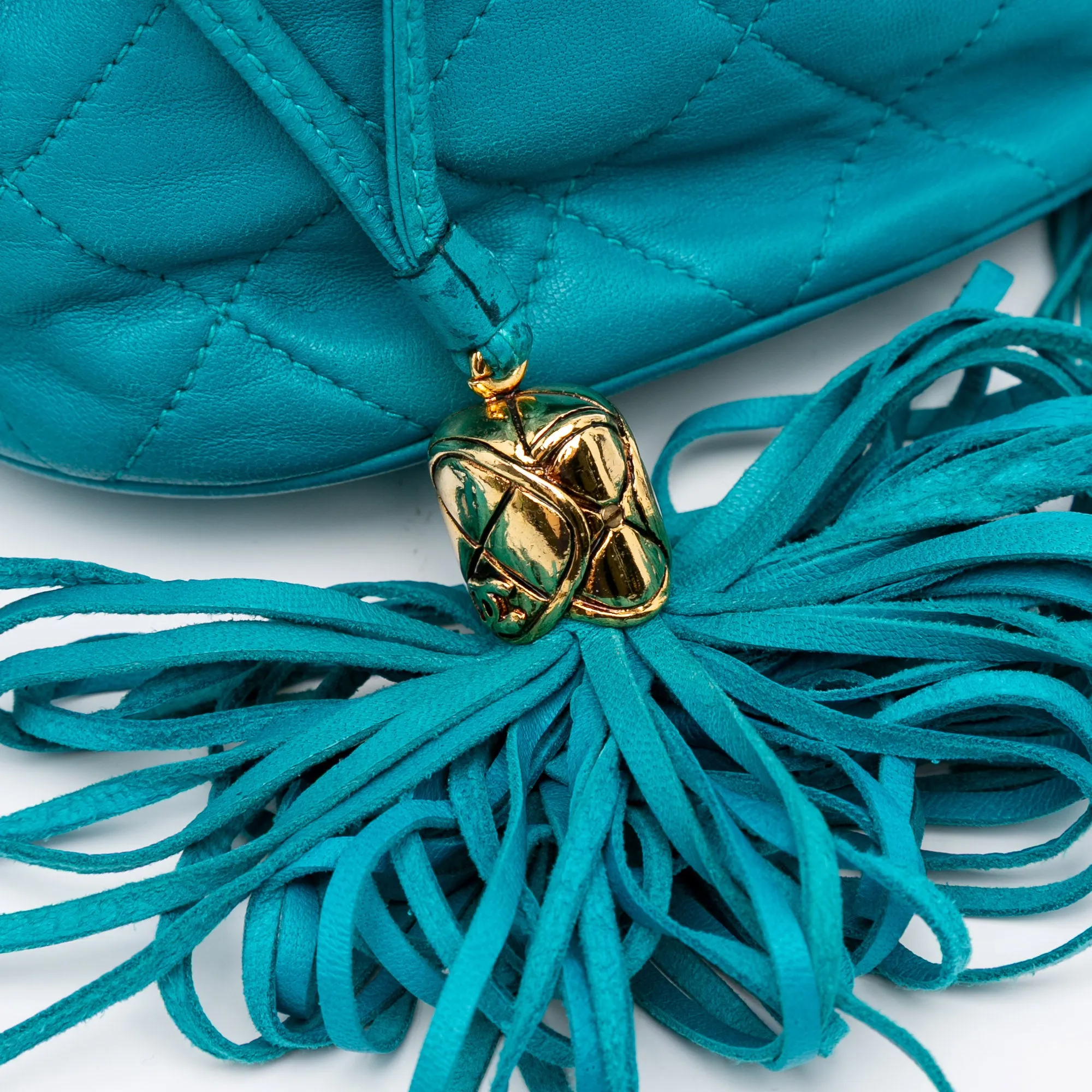 Quilted Lambskin Drawstring Tassel Bucket Bag