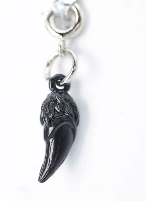 Traveler's Trinkets: Dragon Fang Charm