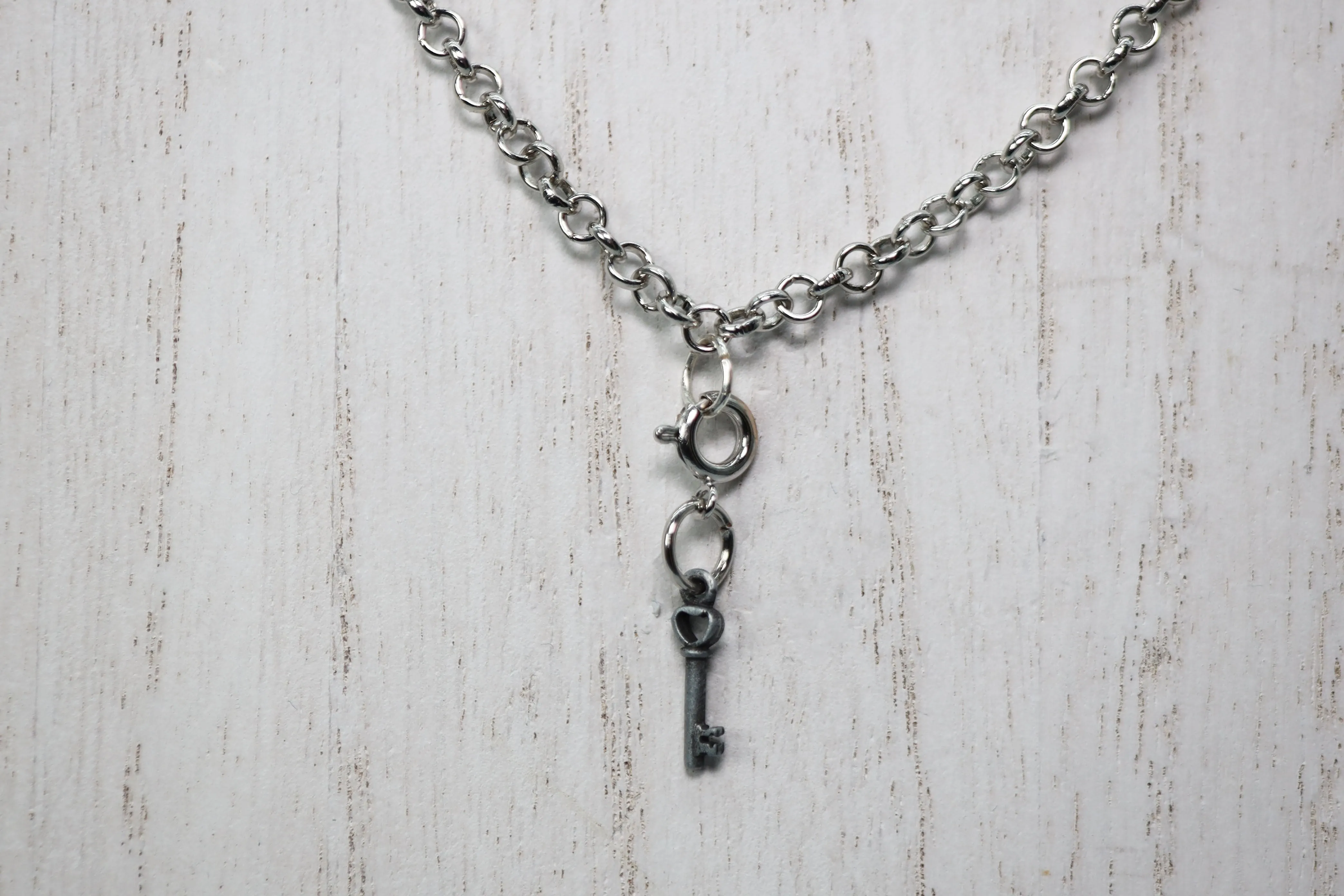Traveler's Trinkets: Key Charm