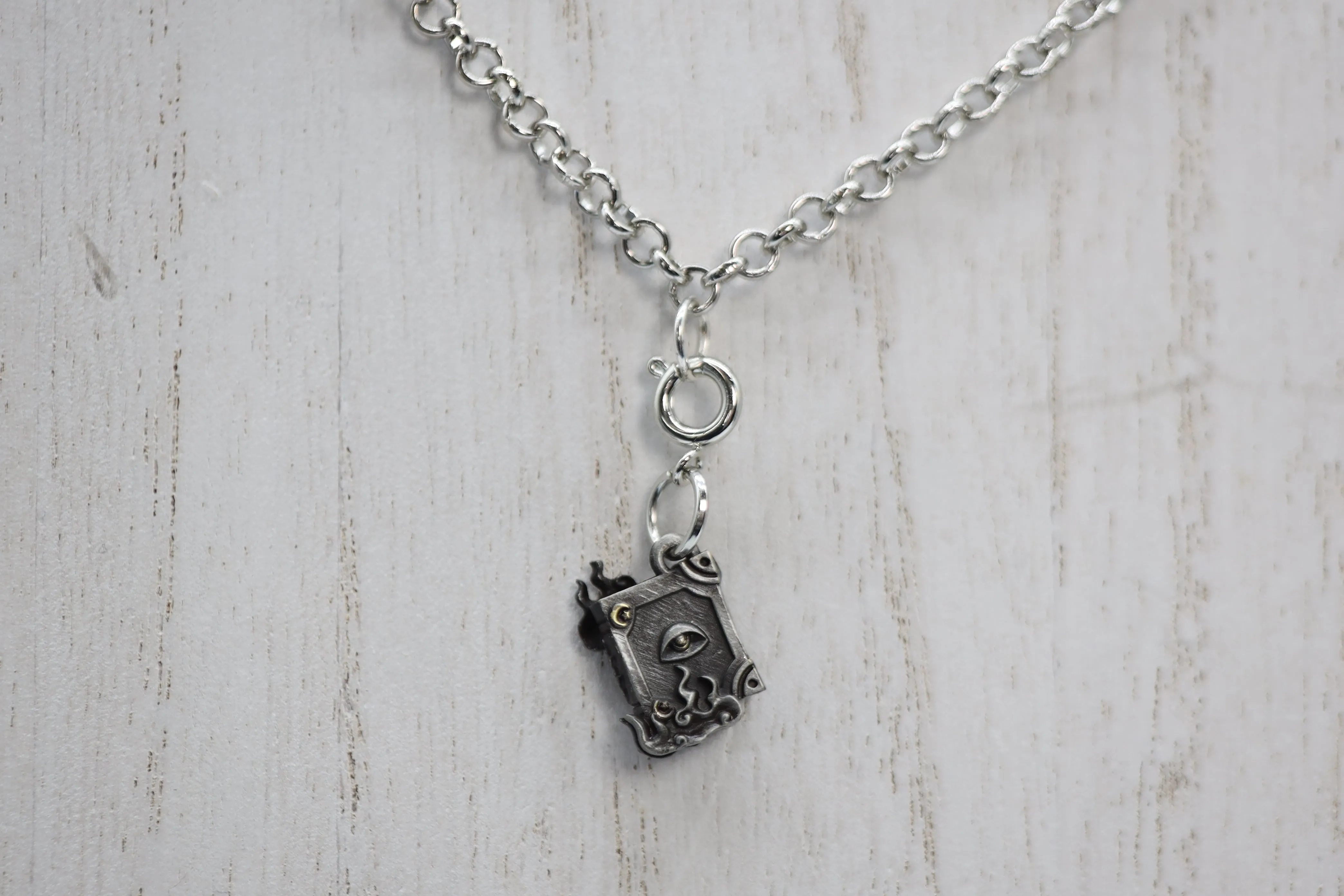 Traveler's Trinkets: Spellbook Charm