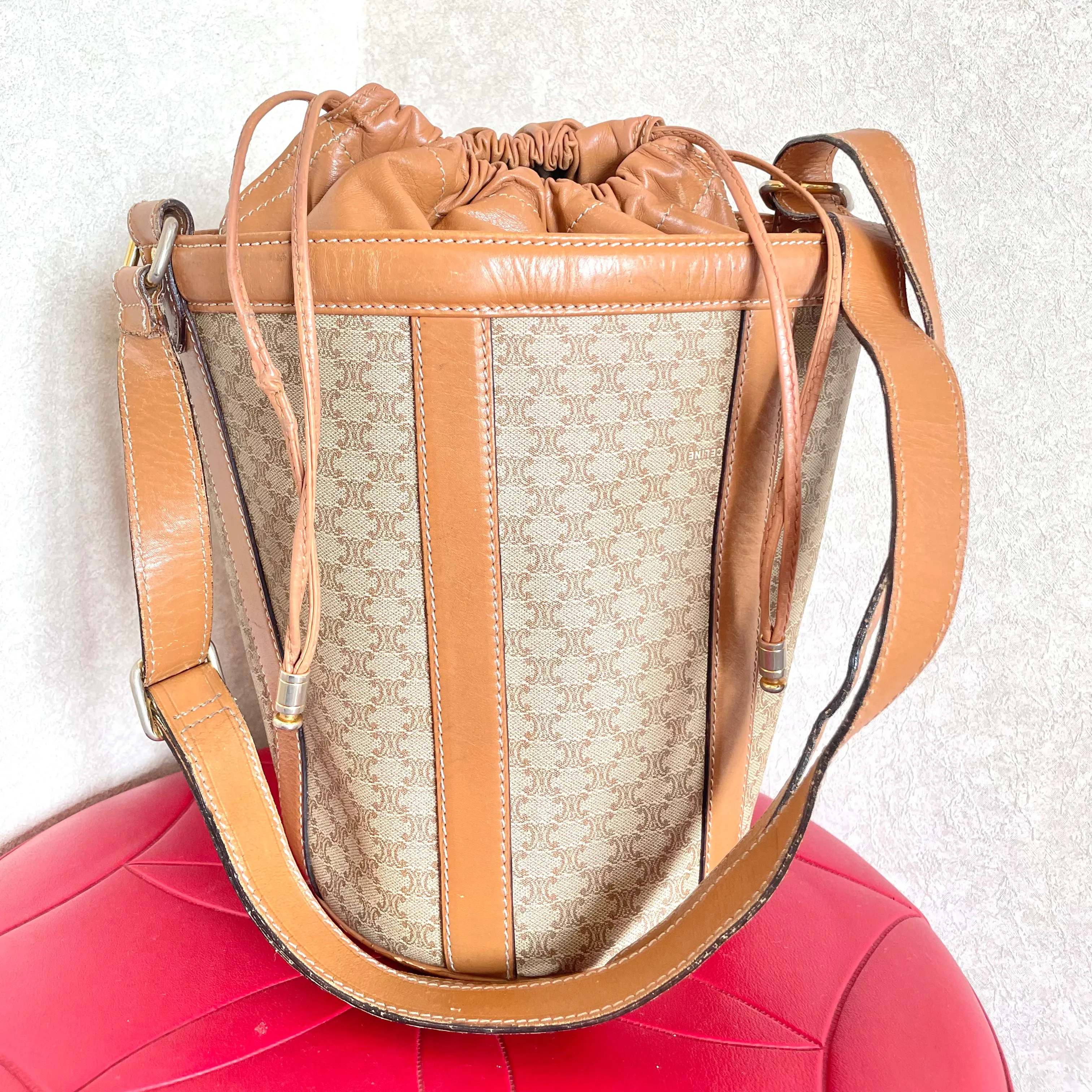 Vintage Celine round box shape hobo bucket shoulder purse in classic brown macadam blaison pattern with leather strap. 050111an1