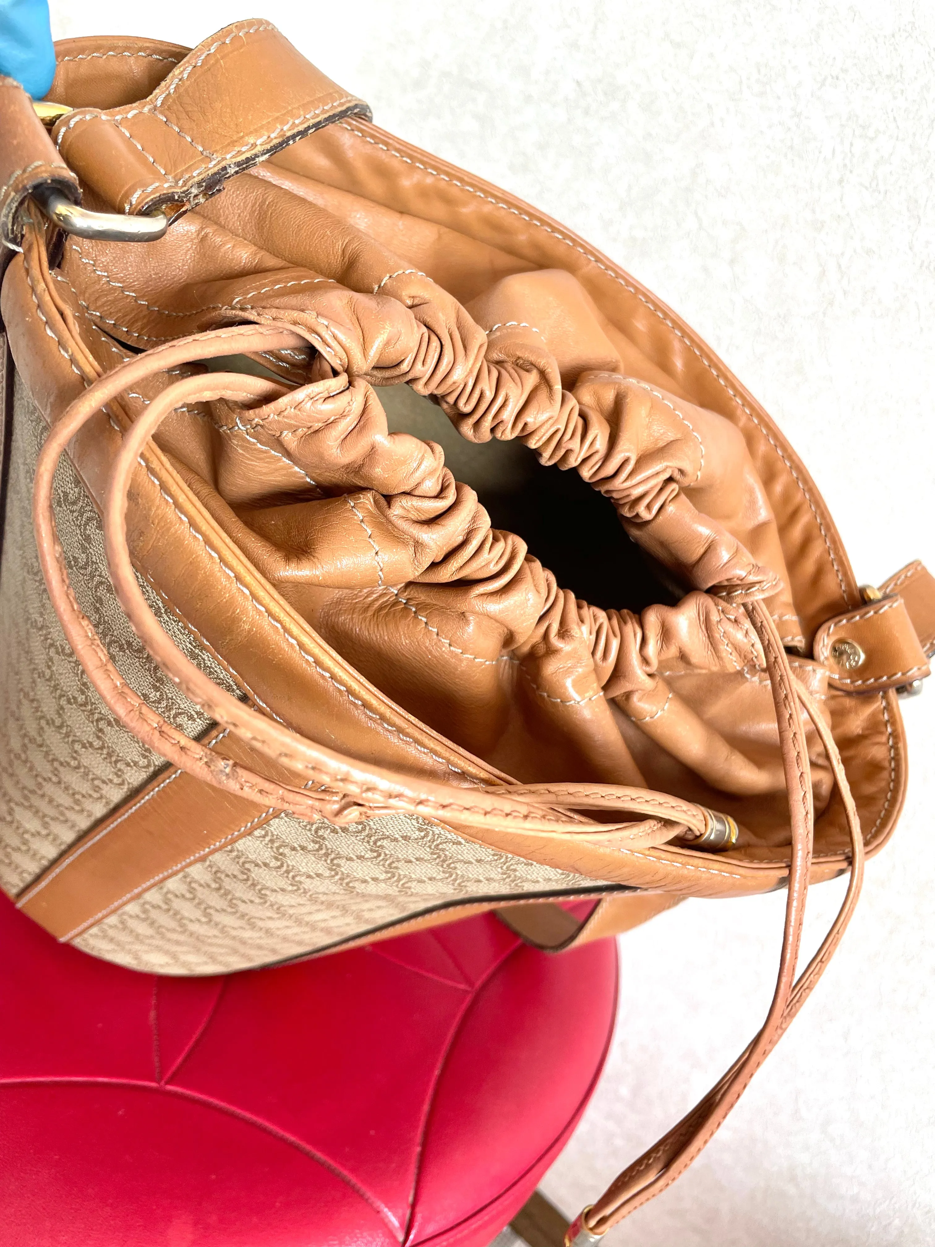 Vintage Celine round box shape hobo bucket shoulder purse in classic brown macadam blaison pattern with leather strap. 050111an1