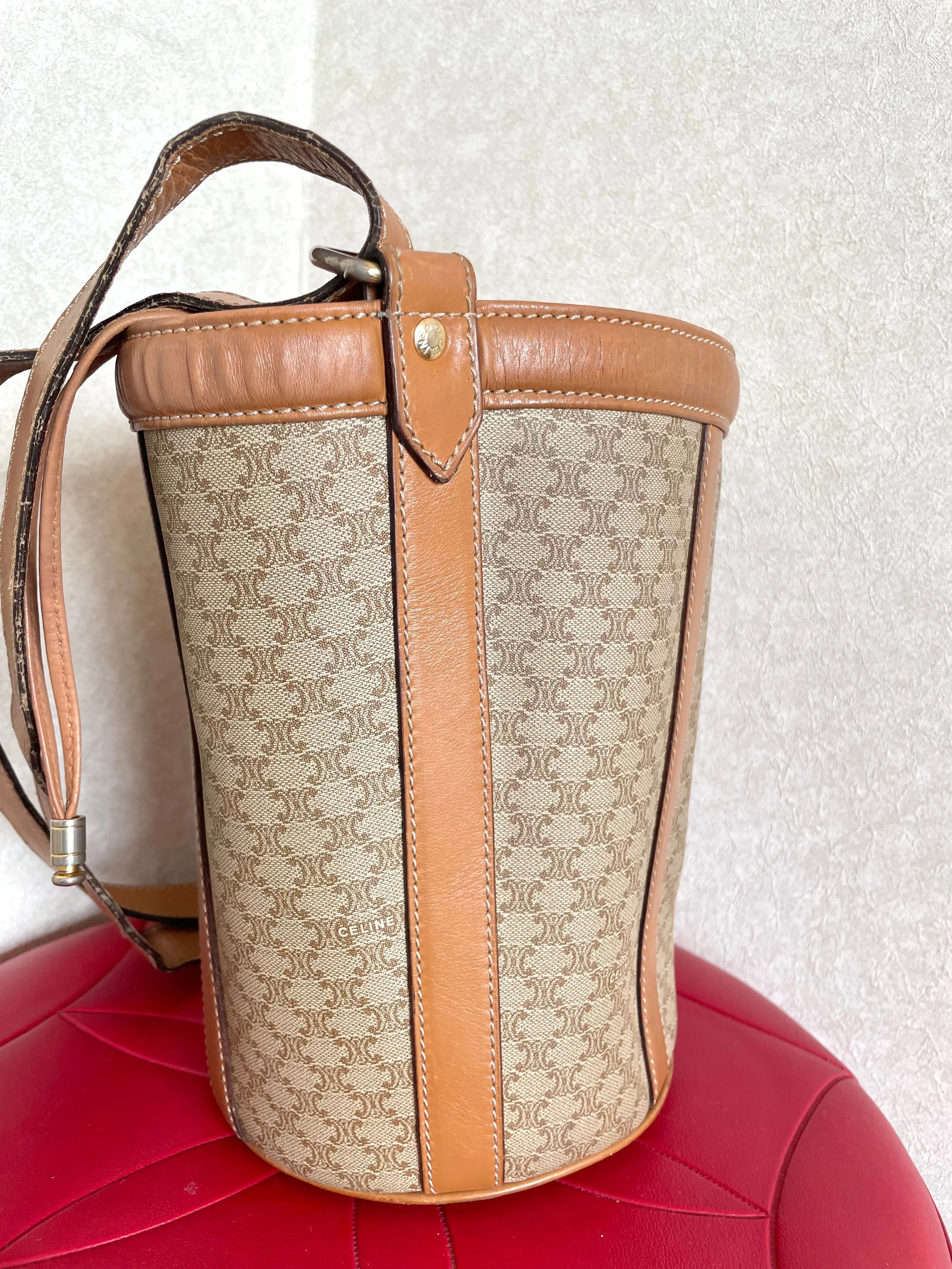 Vintage Celine round box shape hobo bucket shoulder purse in classic brown macadam blaison pattern with leather strap. 050111an1