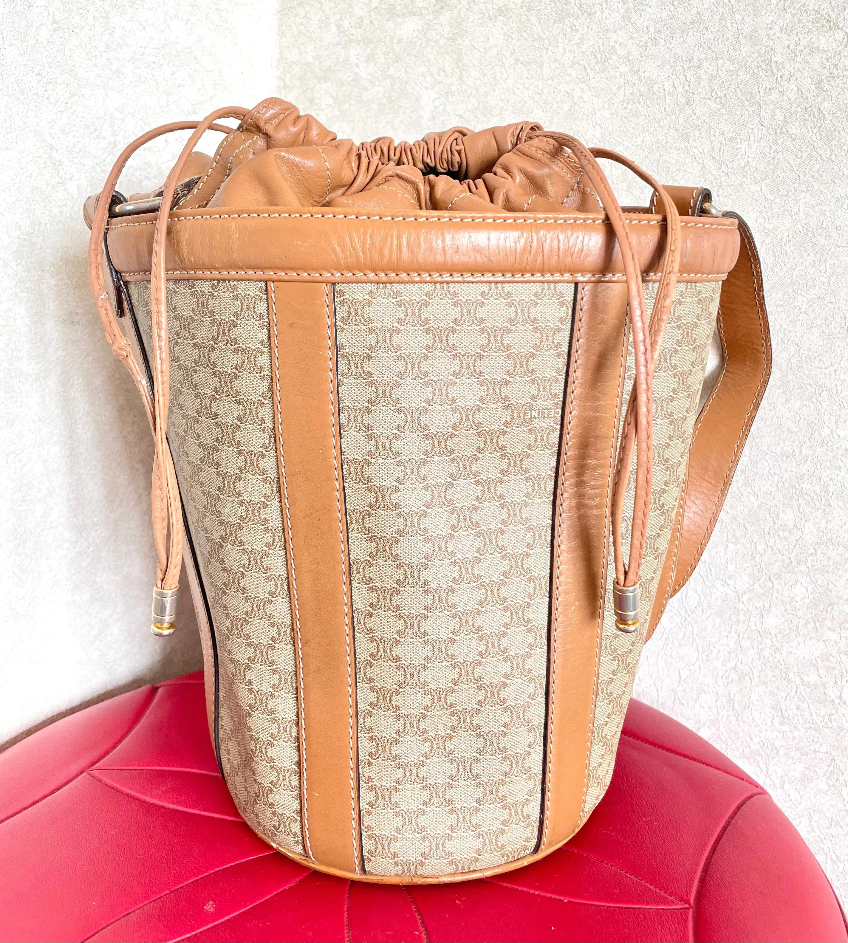 Vintage Celine round box shape hobo bucket shoulder purse in classic brown macadam blaison pattern with leather strap. 050111an1