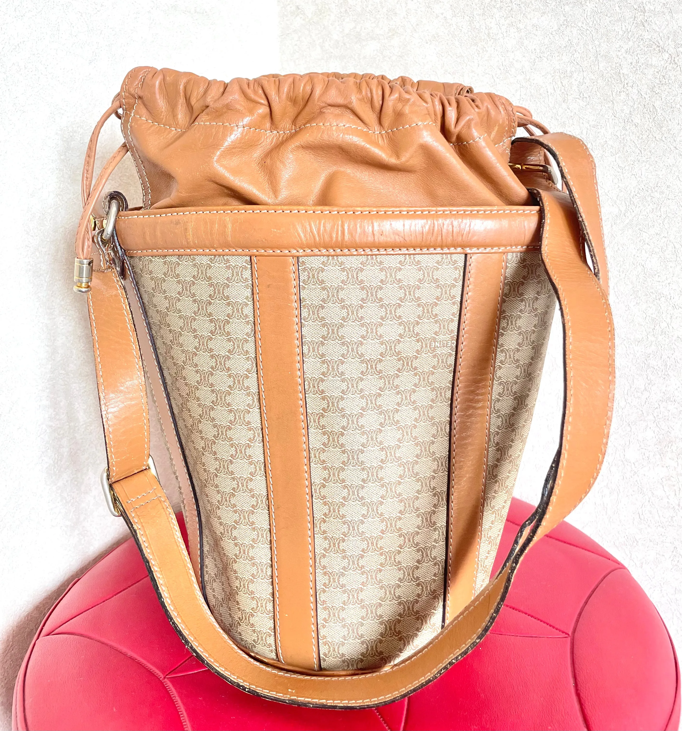 Vintage Celine round box shape hobo bucket shoulder purse in classic brown macadam blaison pattern with leather strap. 050111an1
