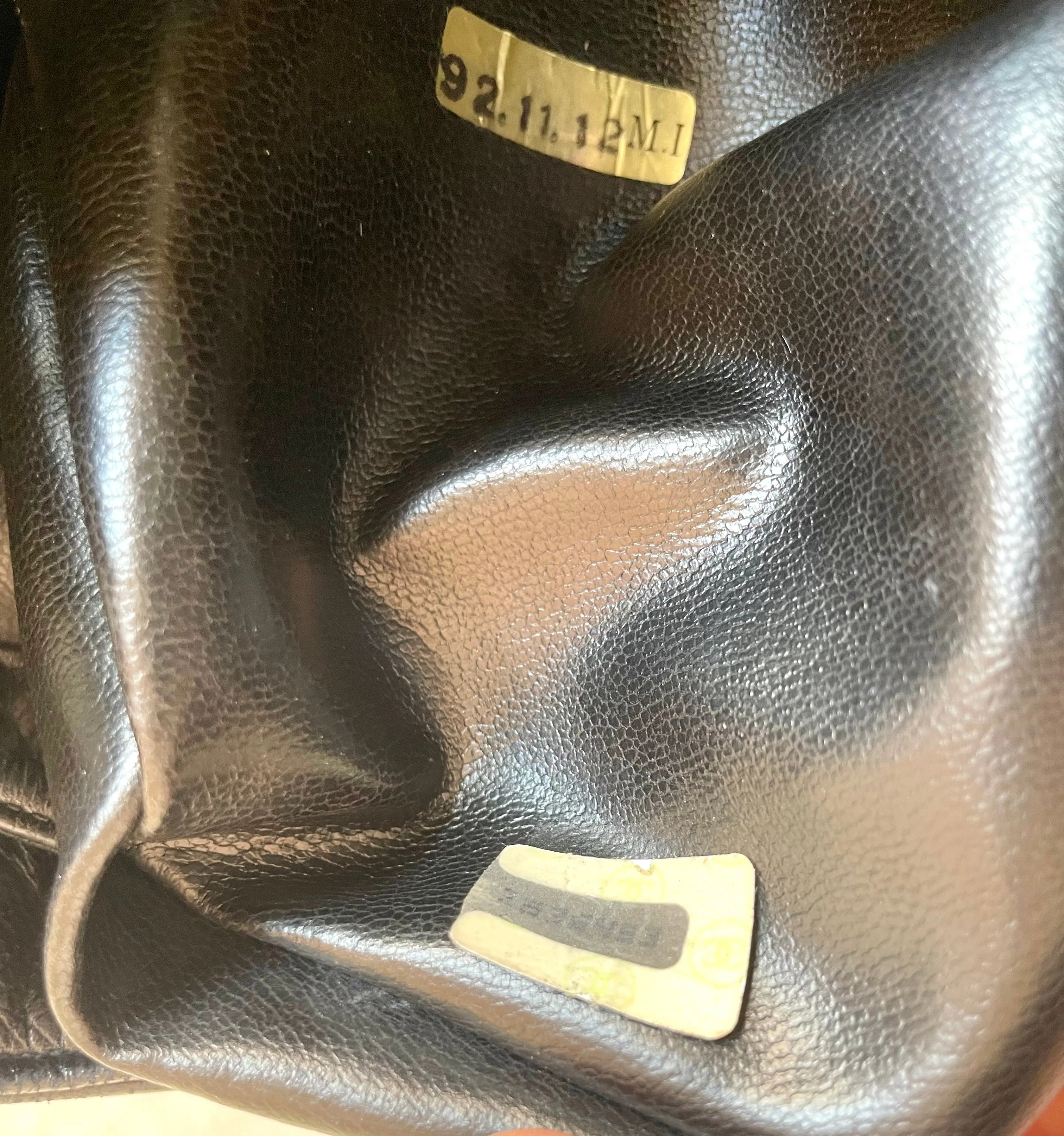 Vintage CHANEL black lambskin bucket hobo drum shoulder bag with golden chain strap, CC mark, and drawstring. 041205bs3
